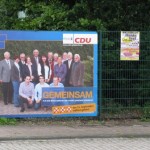 CDU Plakat am Zaun der Vermittlungsstelle der Telekom in Edewecht